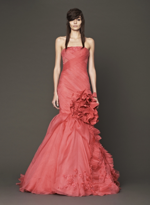 Vera Wang - Fall 2014 Bridal Collection - Wedding Dress Look 9
<br><br>
Coral strapless silk mermaid gown with organza flange detail accented by faille blossom, pleated organza and floral beaded embroidery.

<br><br>